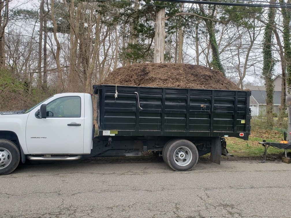 Truck loaded with mulch for a landscaping job